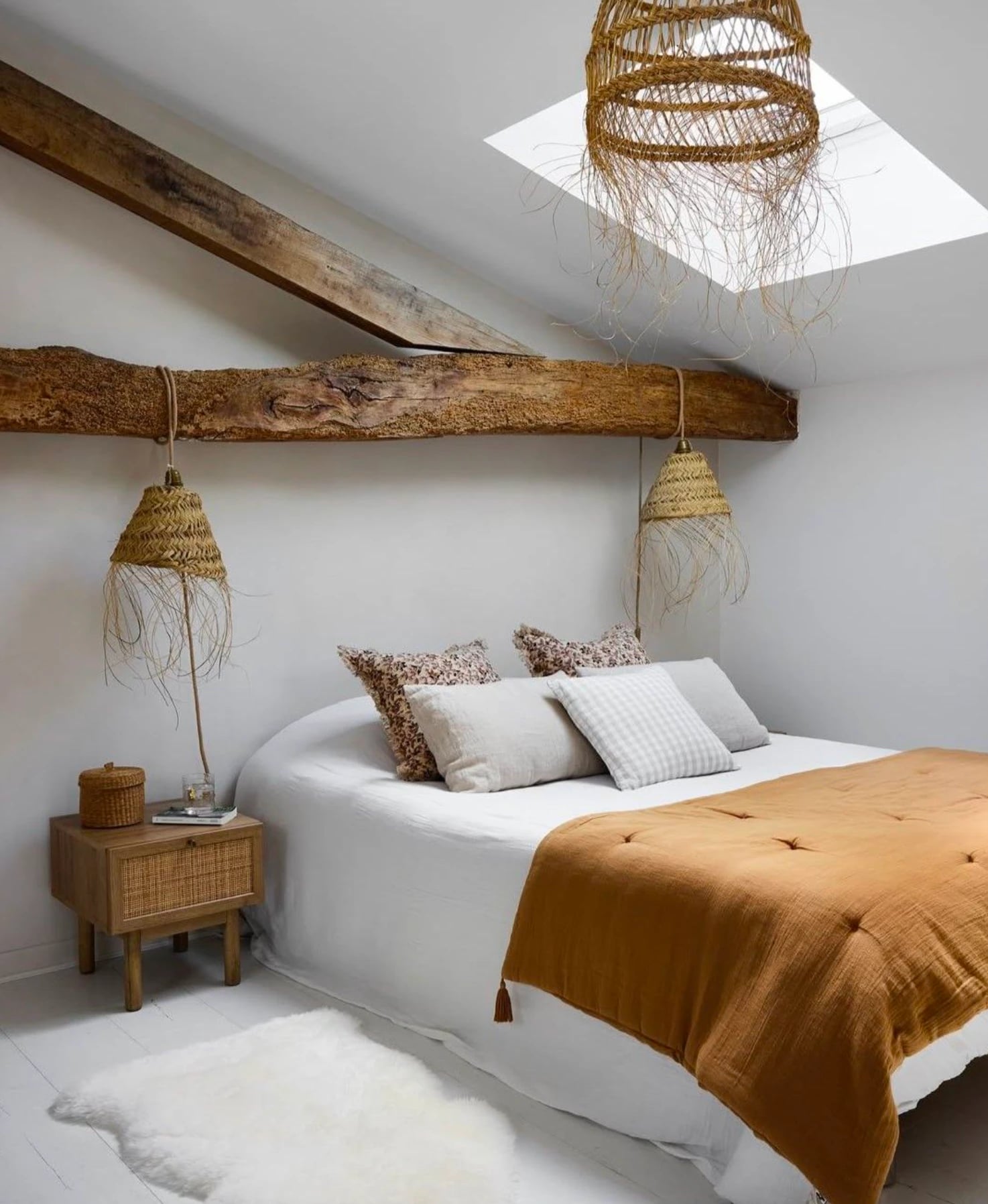 Bedroom with woven ceiling lamps. Handmade, reed, warm lighting.