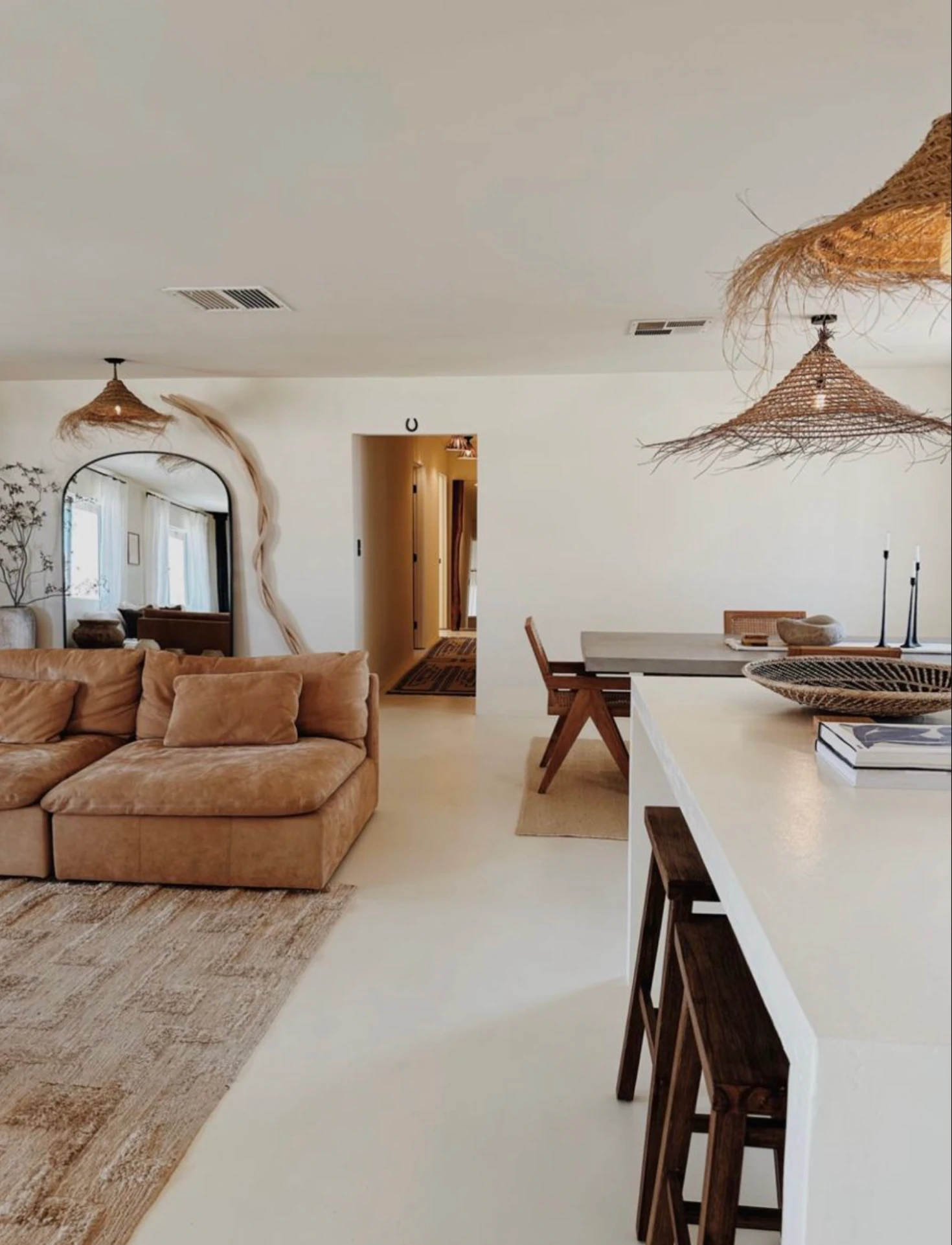 Boho reed ceiling lamps in bright interior. PītasLampas.