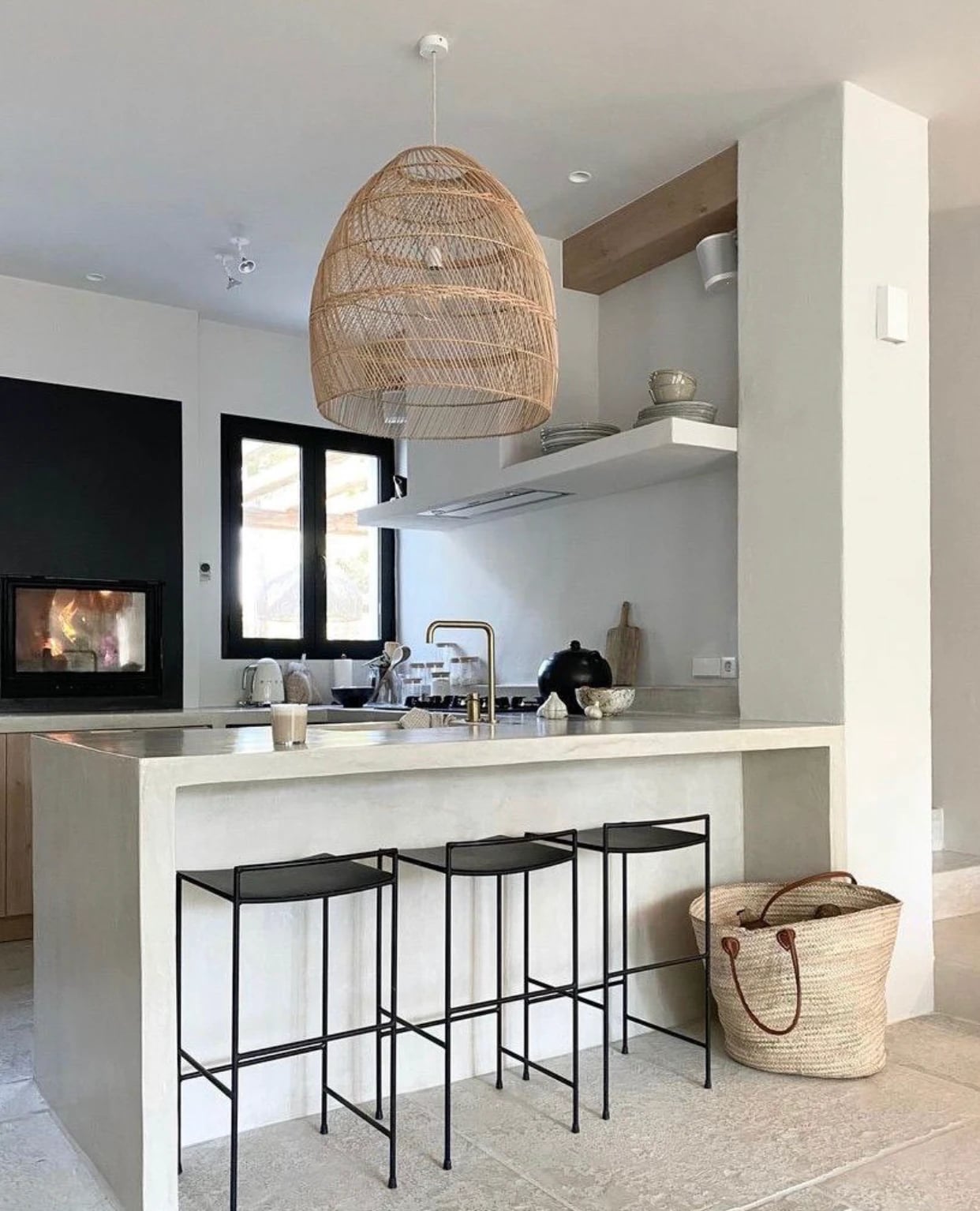 Woven rattan ceiling lamp in kitchen, warm light.